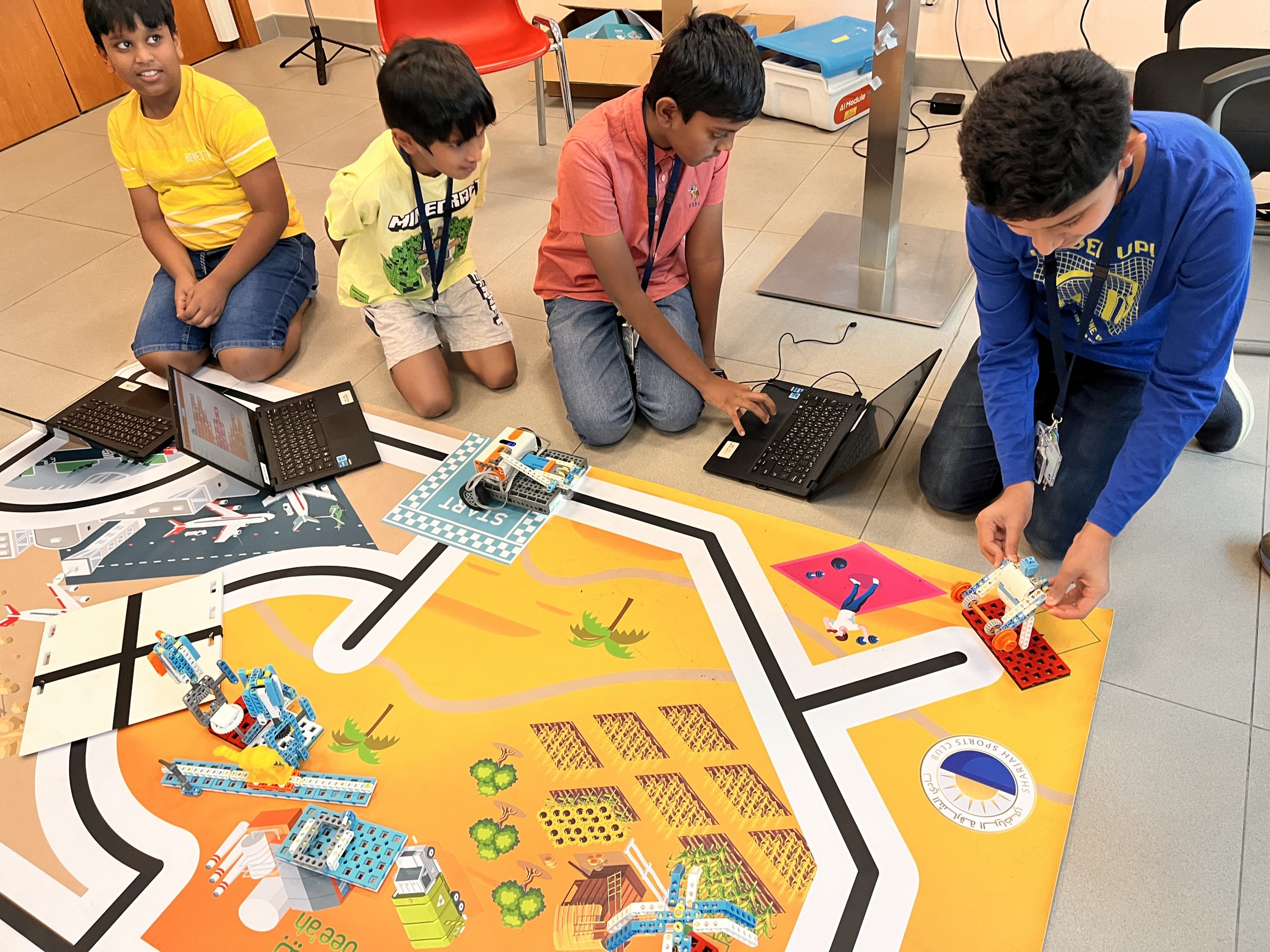 Students collaborating on a hands-on STEAM activity during an EduStream workshop