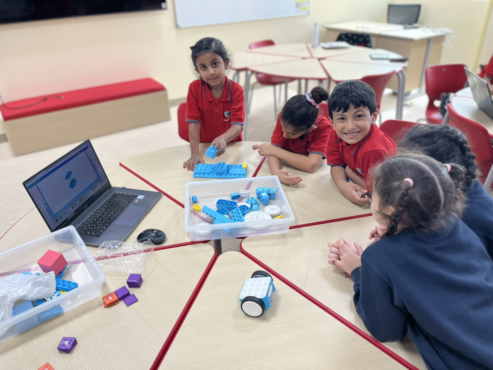 Students working with robotics kits during an EduStream workshop